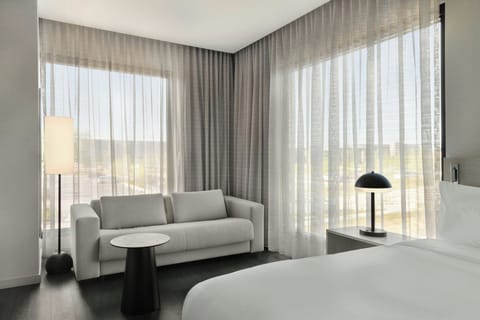 Deluxe Room, 1 King Bed with Sofa bed | In-room safe, blackout drapes, iron/ironing board, travel crib