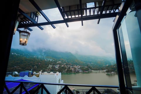 Premium Room, Lake View | Minibar, in-room safe, iron/ironing board, free WiFi