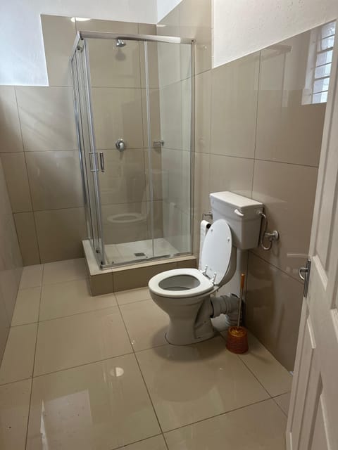 Economy Shared Dormitory, Patio, City View | Bathroom | Shower, free toiletries, towels, toilet paper