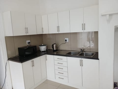 Economy Shared Dormitory, Patio, City View | Private kitchen | Fridge, microwave, stovetop, cookware/dishes/utensils