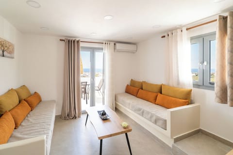 Loft Suite with Sea View | Living area | 32-inch Smart TV with satellite channels