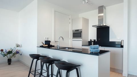 Apartment (Pharos Dunes Terrace) | Private kitchen | Fridge, dishwasher, cookware/dishes/utensils