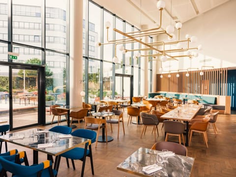 Lunch, dinner served; French cuisine, garden views 