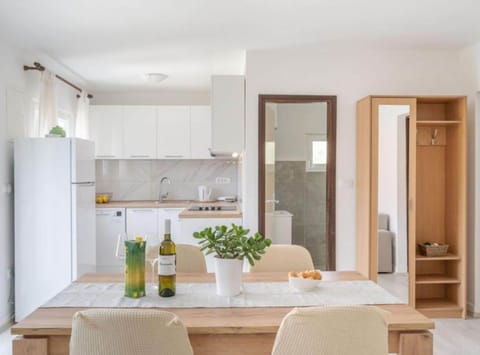 House (Holiday Home Seafront Oleandar) | Living room | 32-inch flat-screen TV with cable channels