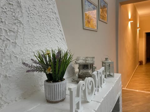 Apartment, Mountain View | Living area | TV, fireplace