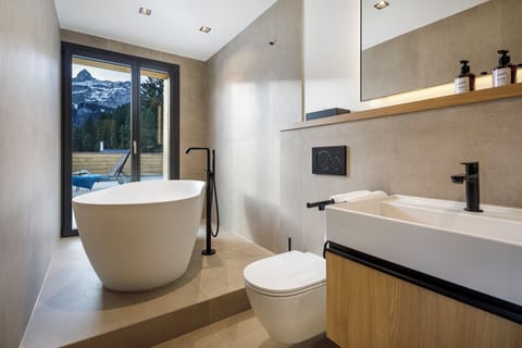 Luxury Suite, Mountain View | Bathroom | Separate tub and shower, hair dryer, towels, soap