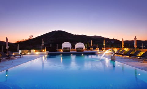 Indoor pool, seasonal outdoor pool, pool umbrellas, sun loungers