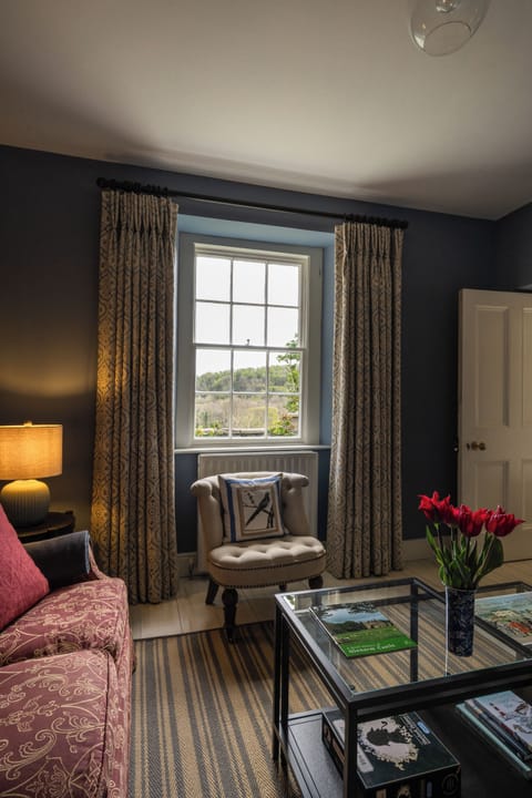 Cottage, 2 Bedrooms | Living area | 32-inch LCD TV with cable channels