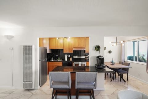 Family Apartment, 2 Bedrooms, Patio | Private kitchen | Coffee/tea maker, dining tables