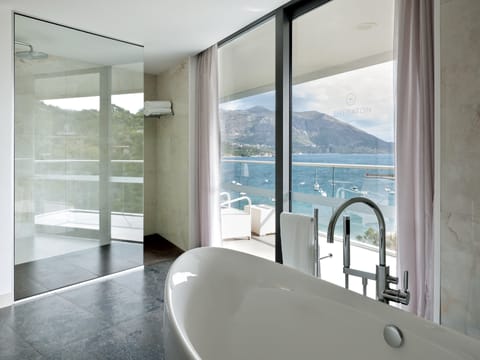 Suite, 1 Bedroom, Sea View | Bathroom | Separate tub and shower, deep soaking tub, free toiletries, hair dryer