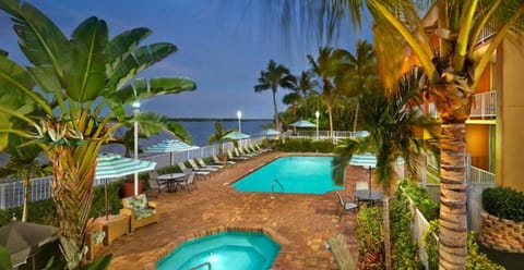 Outdoor pool, open 7 AM to 11 PM, pool umbrellas, sun loungers