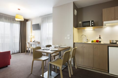 Apartment, 1 Bedroom | Private kitchen | Fridge, microwave, coffee/tea maker, electric kettle