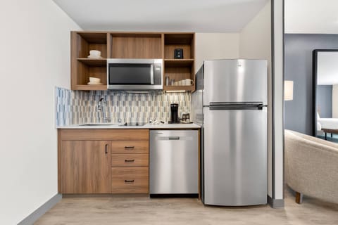 Suite, 2 Queen Beds, Non Smoking | Desk, laptop workspace, blackout drapes, iron/ironing board