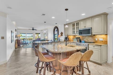 Villa, Multiple Beds, Kitchen, Ocean View (1850 Beachside Tennis) | Private kitchen | Coffee/tea maker, dining tables