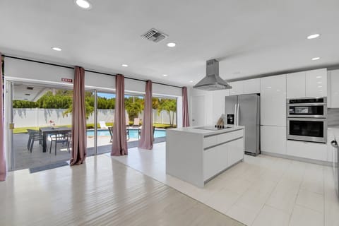 Family House, Pool View | Private kitchen | Coffee/tea maker, electric kettle, highchair