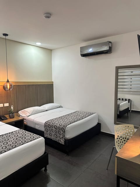 Standard Twin Room | Minibar, in-room safe, desk, free WiFi
