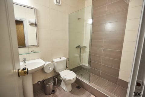 Shower, free toiletries, hair dryer, slippers