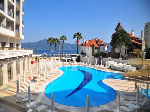 Indoor pool, outdoor pool, pool umbrellas, sun loungers