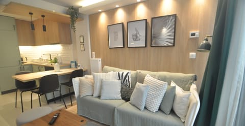 Premium Apartment, City View | Living area | Flat-screen TV