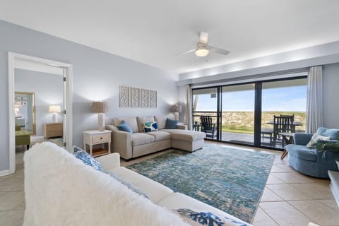 Condo, Multiple Beds (Shipwatch A104) | Living area | TV