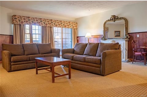 Executive Suite, Non Smoking, Balcony | Living area | 24-inch TV with cable channels, table tennis, stereo