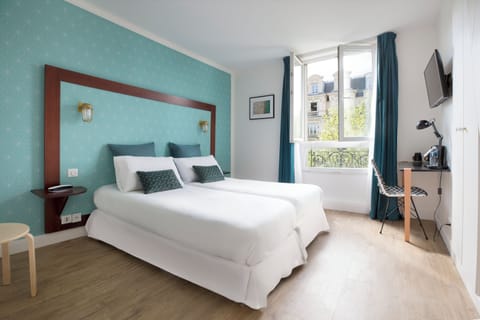 Blackout drapes, soundproofing, WiFi (free), alarm clocks