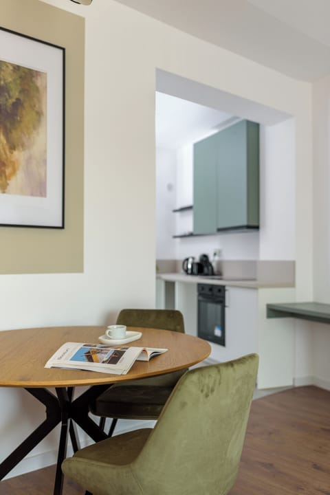 Superior Apartment, Balcony, City View | In-room dining