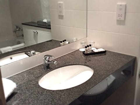 Shower, eco-friendly toiletries, hair dryer, towels