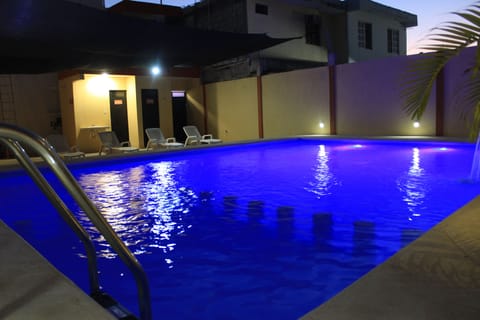 Outdoor pool, open 8:30 AM to 6:00 PM, sun loungers