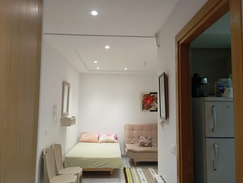 Comfort Apartment, Balcony, Garden View | Living area | 100-cm plasma TV with cable channels