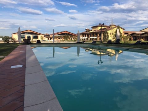 Seasonal outdoor pool, pool umbrellas, sun loungers