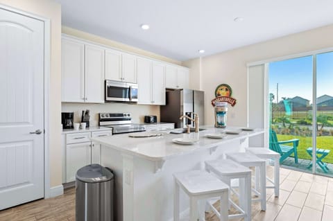 Townhome, Multiple Beds, Patio, Garden View (Capri Sunset) | Private kitchen | Fridge, microwave, oven, stovetop