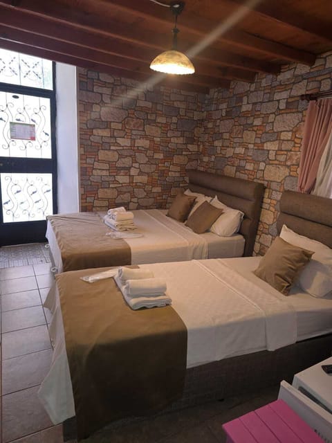 Family Triple Room | Blackout drapes, soundproofing, free WiFi
