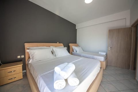 Two-Bedroom Family Room with Balcony and Sea View (4 Adults) | Free WiFi, bed sheets