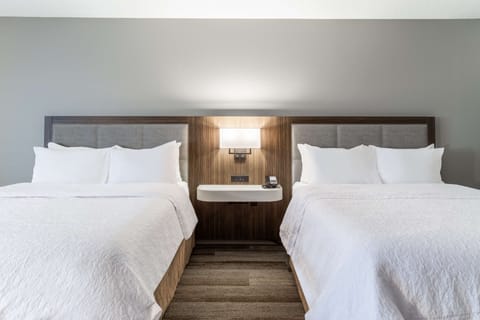 Standard room with two double beds | Individually furnished, desk, laptop workspace, blackout drapes