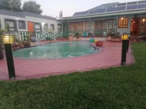 Deluxe Room, Pool View | Terrace/patio