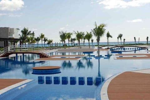 Outdoor pool, open 9 AM to 9 PM, free cabanas, pool umbrellas
