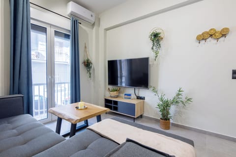Apartment, 2 Bedrooms, Kitchen, City View | Living room | 55-inch Smart TV with digital channels, streaming services