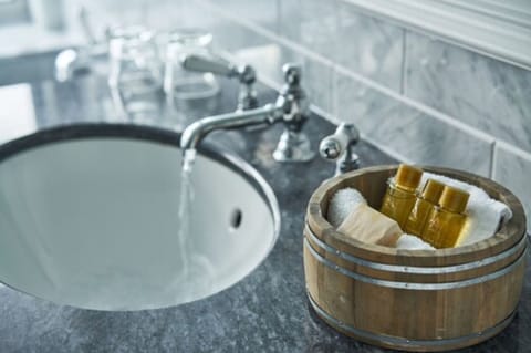 Combined shower/tub, eco-friendly toiletries, hair dryer, towels