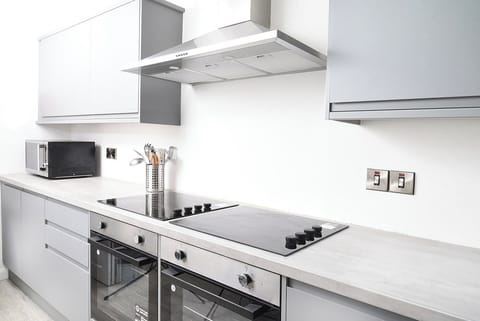 Fridge, microwave, oven, cookware/dishes/utensils