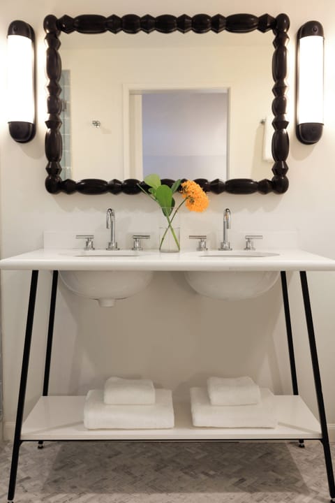 Shower, designer toiletries, hair dryer, bathrobes