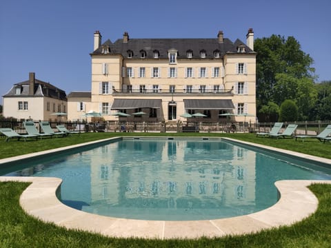Outdoor pool, open 8:00 AM to 8:00 PM, pool umbrellas, sun loungers