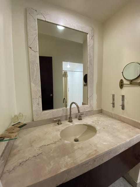 Shower, rainfall showerhead, towels, soap