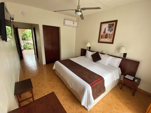 Standard Room, 1 King Bed, Non Smoking, City View | Desk, blackout drapes, free WiFi, bed sheets