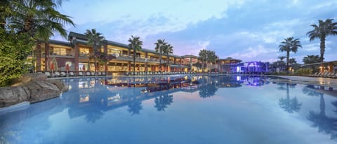 2 indoor pools, 3 outdoor pools, open 7:00 AM to 7:30 PM, pool umbrellas