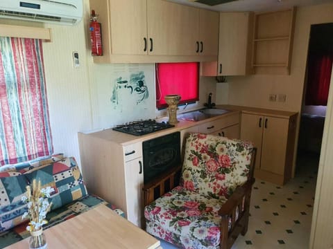 Basic Chalet | Living area | 22-inch flat-screen TV with cable channels