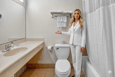 Combined shower/tub, towels, soap, shampoo