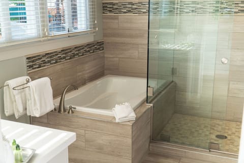 Grand Teton Suite | Bathroom | Shower, hair dryer, bathrobes, slippers