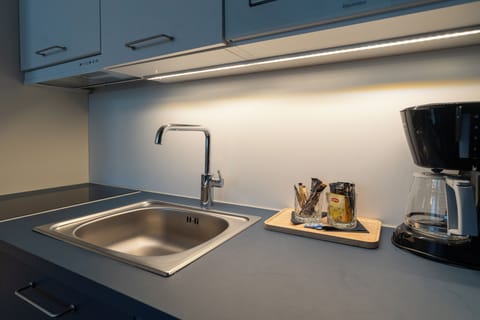 Family Suite, City View | Private kitchen | Electric kettle