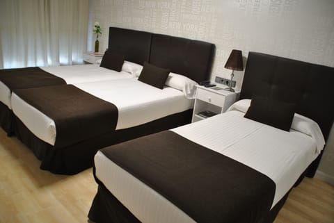 Double or Twin Room (with extra bed) | Desk, blackout drapes, free cribs/infant beds, rollaway beds